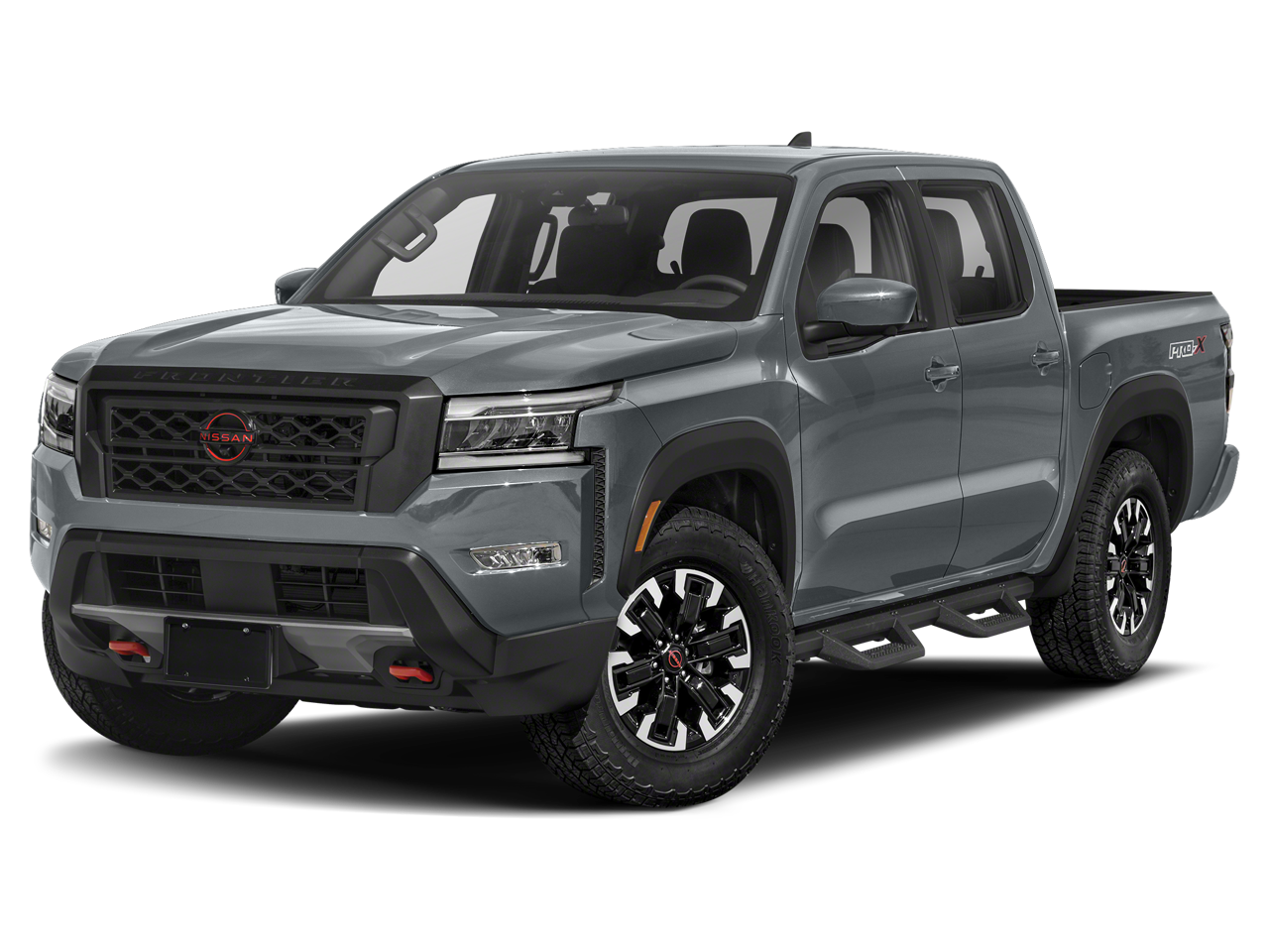 2024 Nissan Frontier PRO-4X in Boulder Gray Pearl — front three-quarter view
