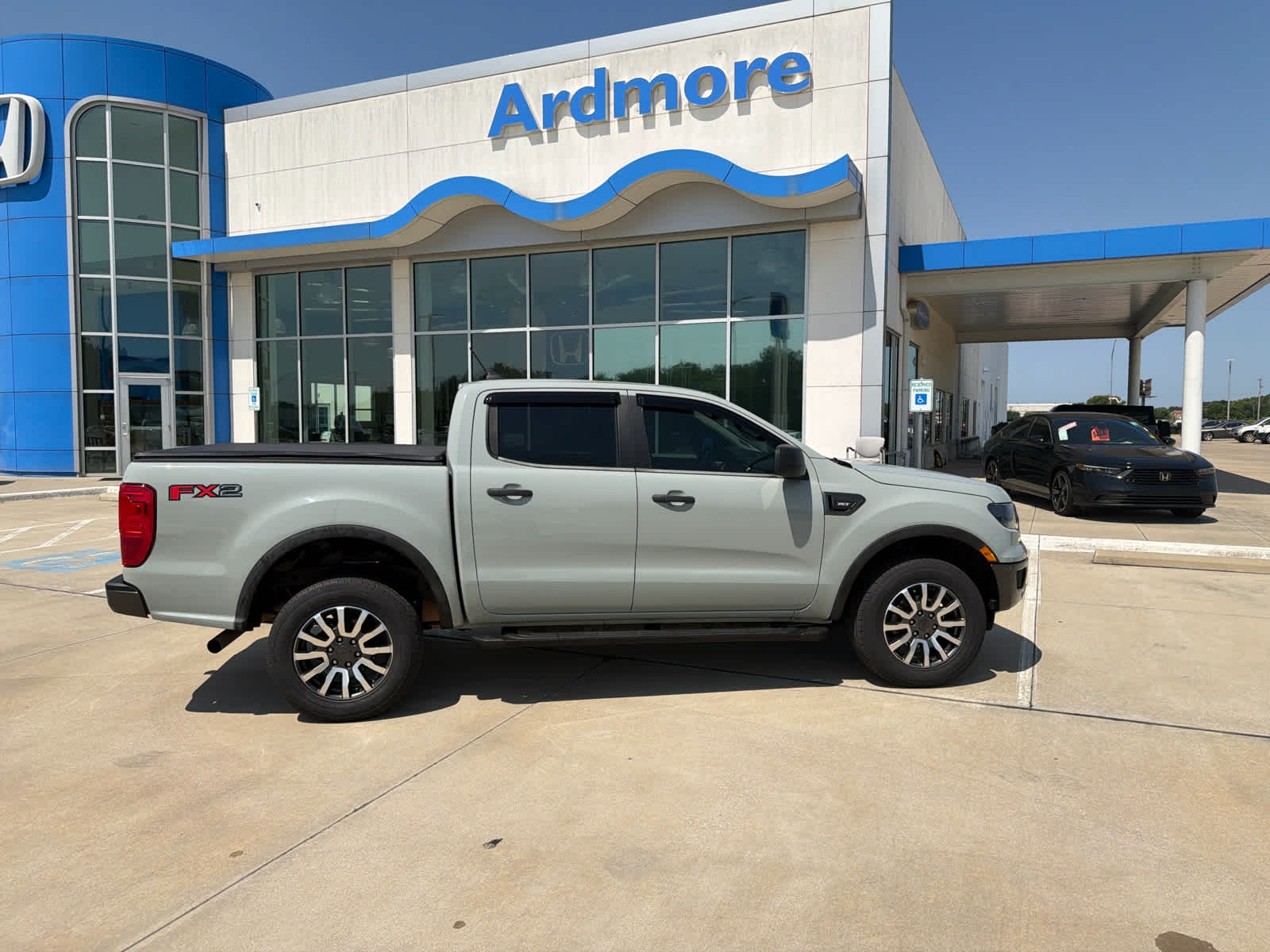 2021 Ford Ranger XLT in Cactus Gray — front three-quarter view