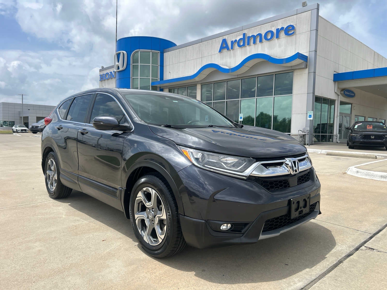 2019 Honda CR-V EX-L in Gunmetal Metallic — front three-quarter view
