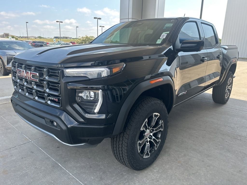 2025 GMC Canyon AT4 in Onyx Black — front three-quarter view